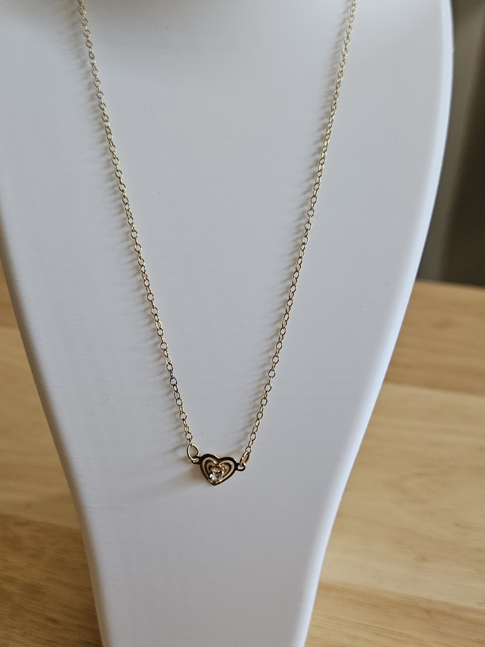 Delicate Gold Heart Pendant Necklace with Center Stone.